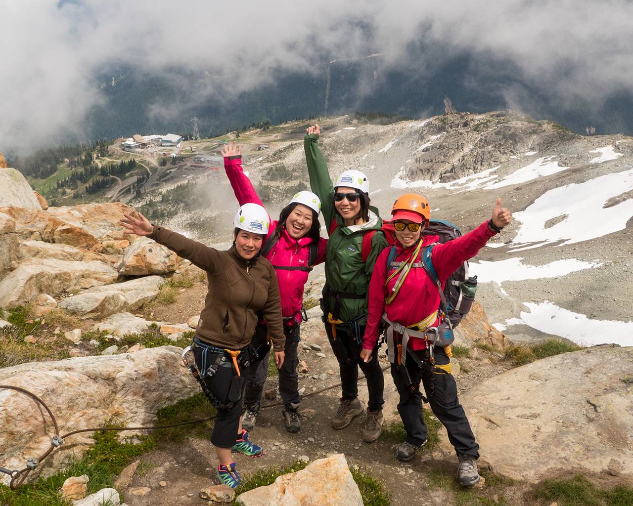 Group picture after summiting whistler mountain during the via ferrata tour