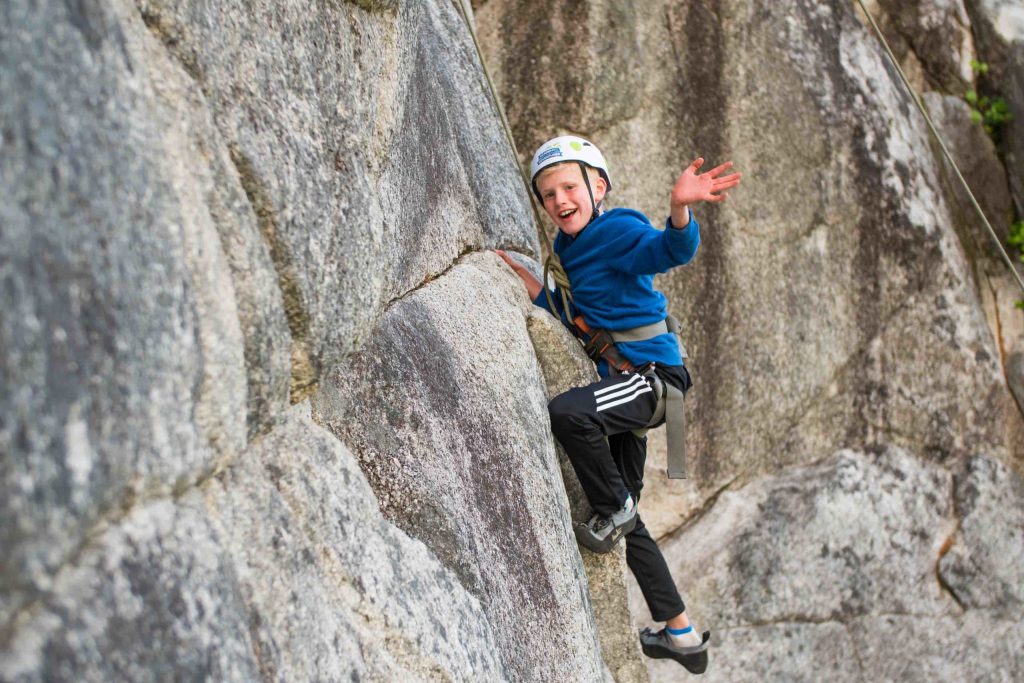 boy climbing in Squamish BC